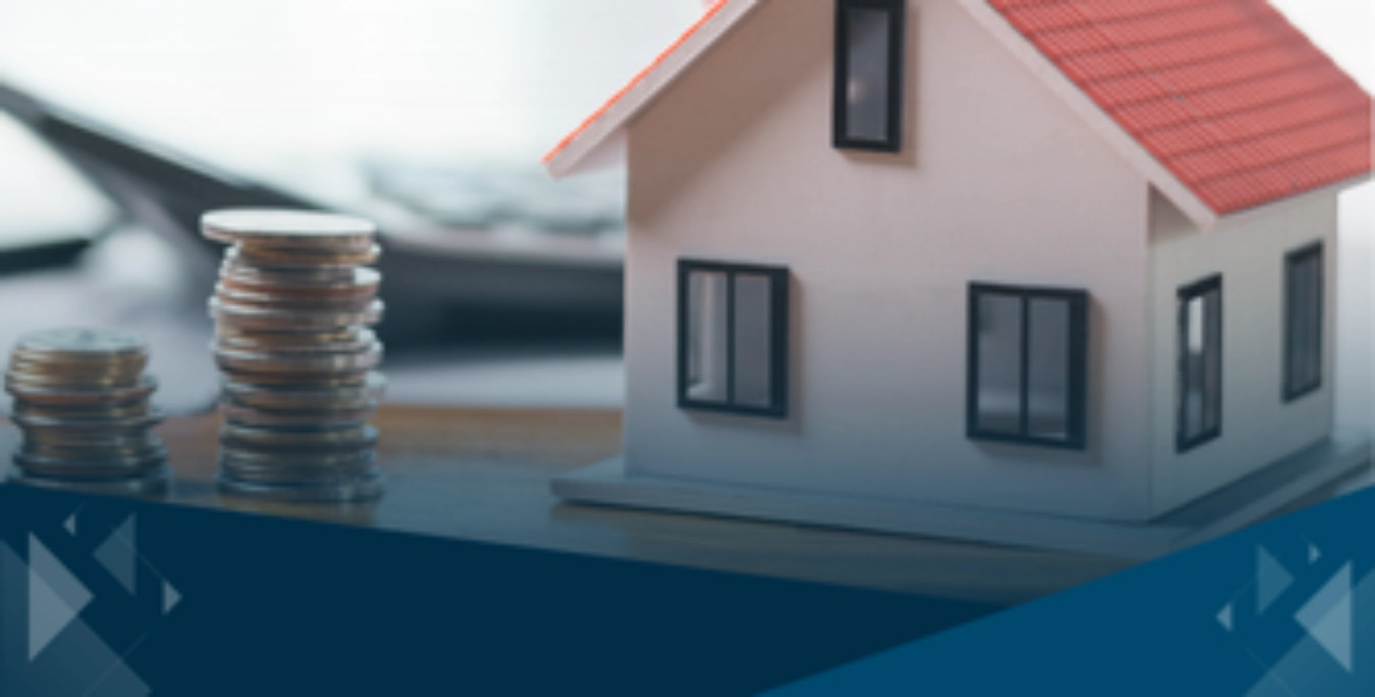 Model house with stacked coins representing the tax-free rental income opportunity under the Augusta Rule